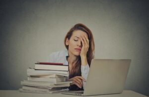Woman sitting tired of work